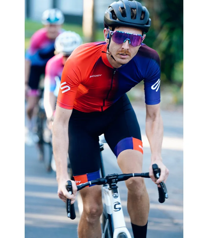 Bright Red through Orange through Purple Cycle Jersey with black bibs and matching cuffs | Cycling Gear