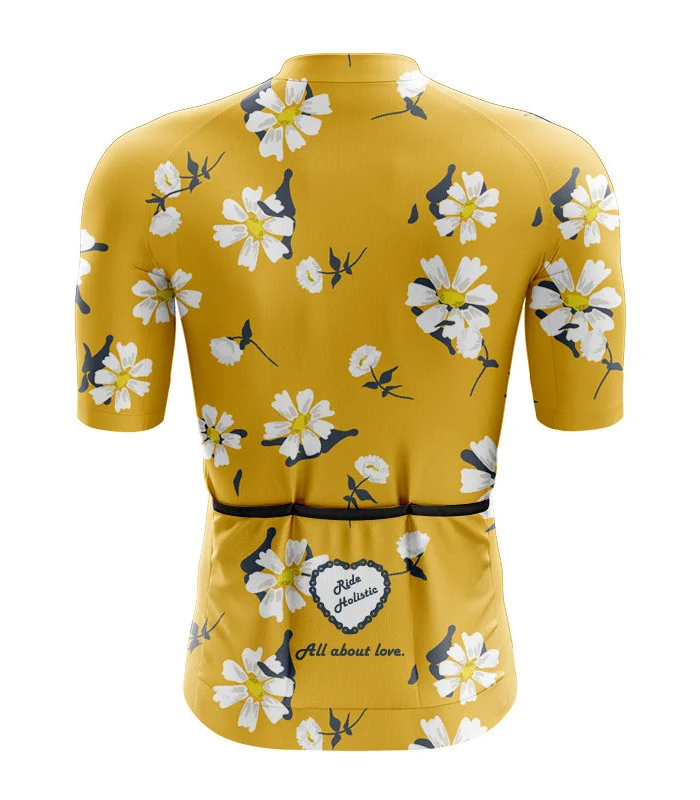 A cycle jersey with a buttercup yellow body with scattered white flowers | Cycling Jersey