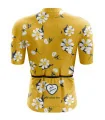 A cycle jersey with a buttercup yellow body with scattered white flowers | Cycling Jersey